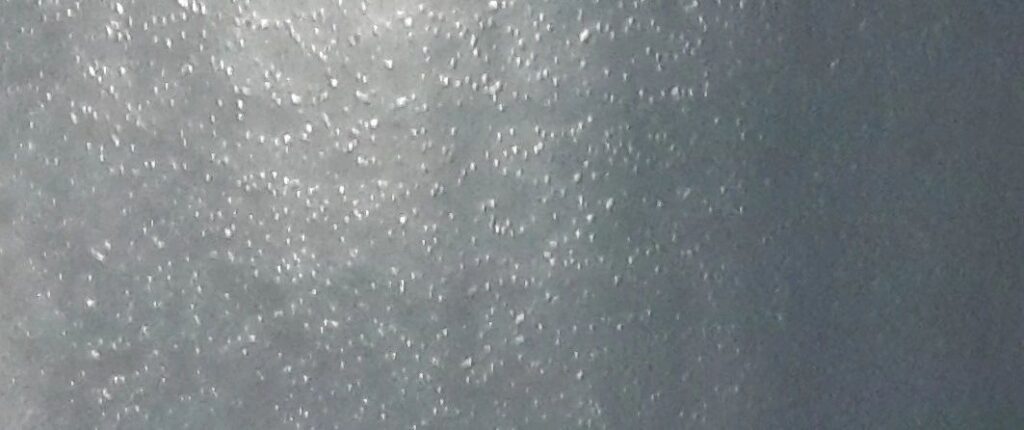 Anode surface agglomerate particles